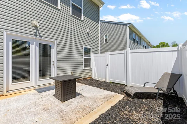 a view of a back yard of the house