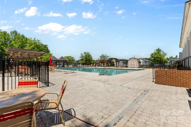 a view of a terrace with sitting area