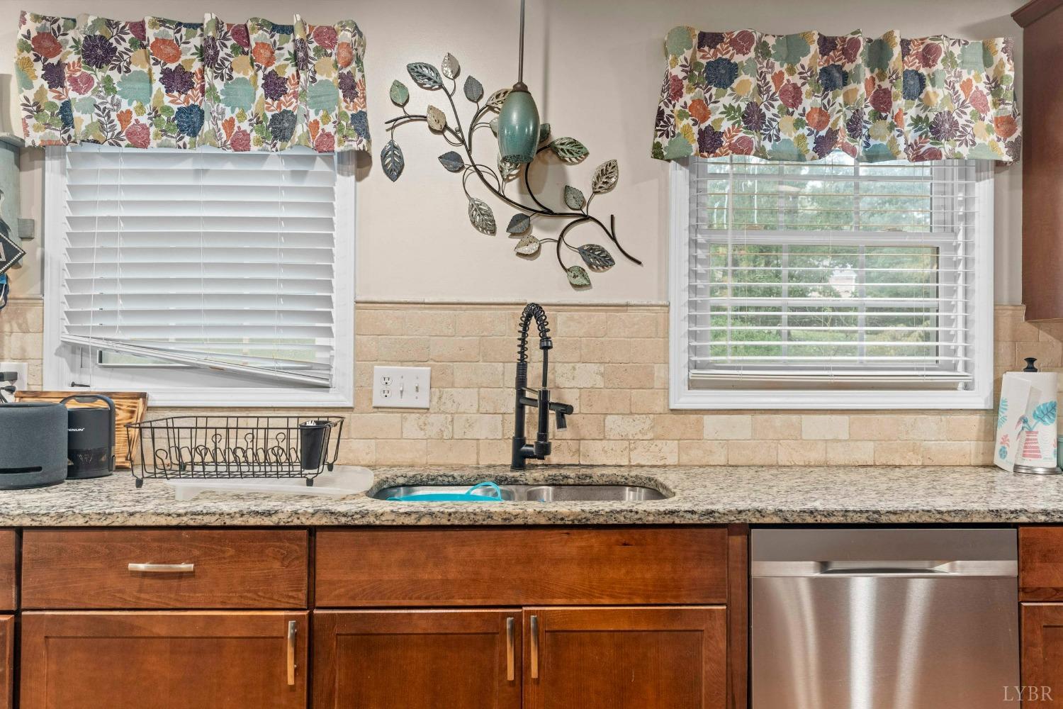 858 Farfields Drive Lynchburg, VA 24502 - Photo 11 of 61 a bathroom with a granite countertop sink and a window