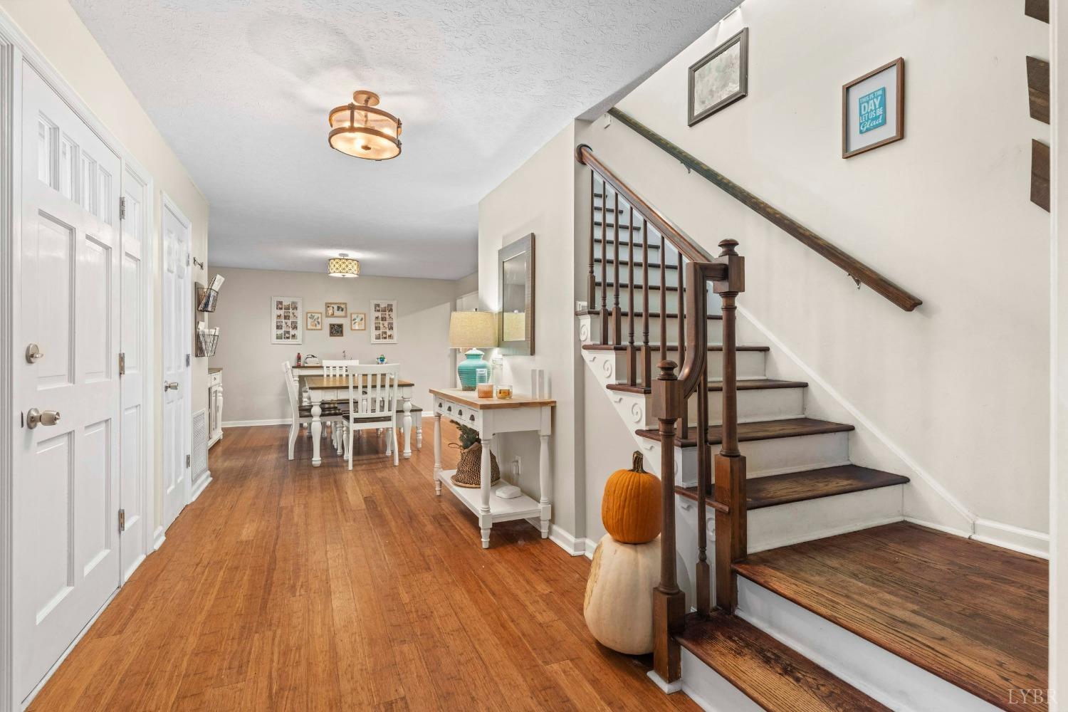 858 Farfields Drive Lynchburg, VA 24502 - Photo 14 of 61 a view of dining room and hall with wooden floor