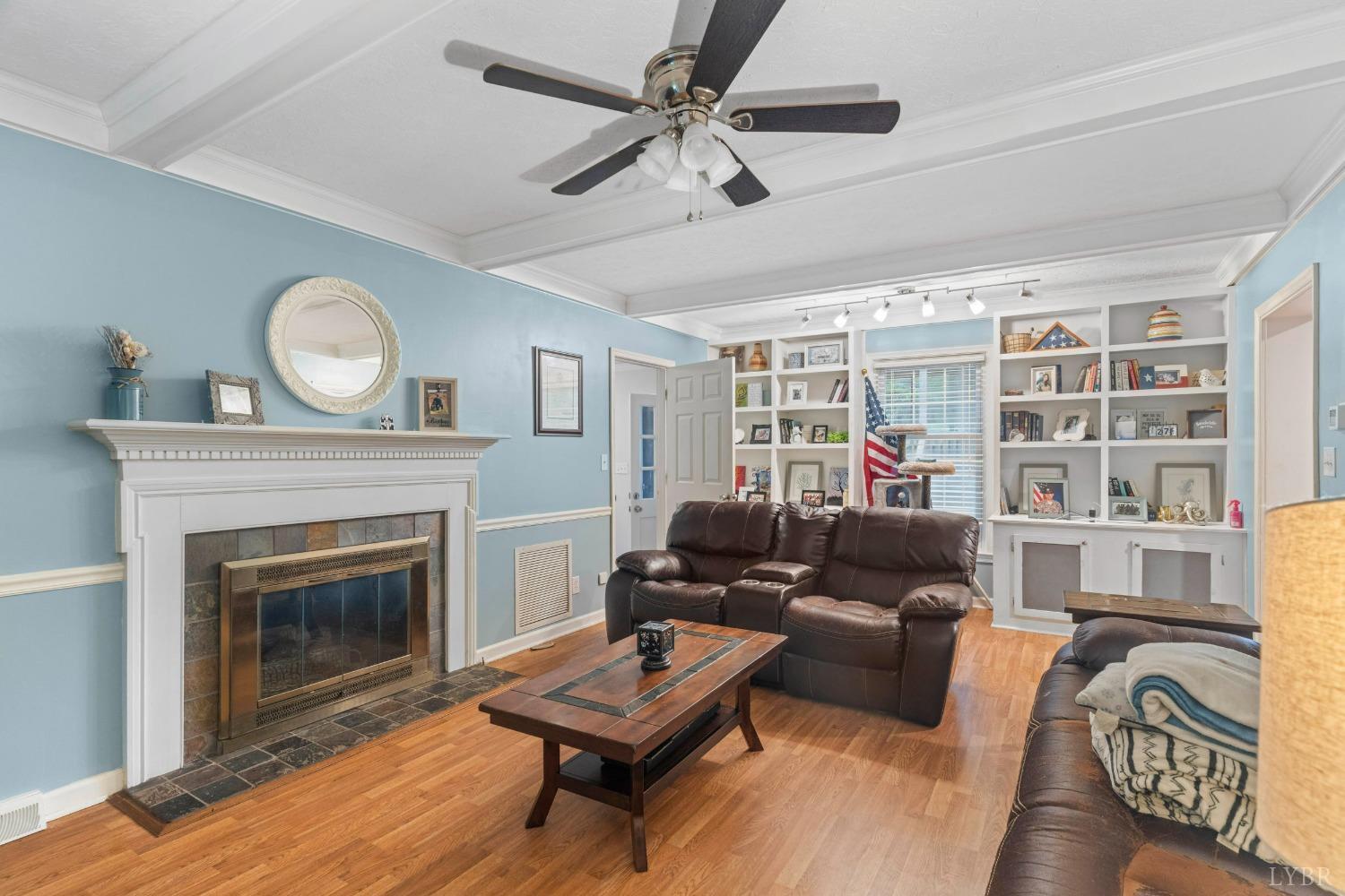 858 Farfields Drive Lynchburg, VA 24502 - Photo 17 of 61 a living room with furniture a fireplace and a window