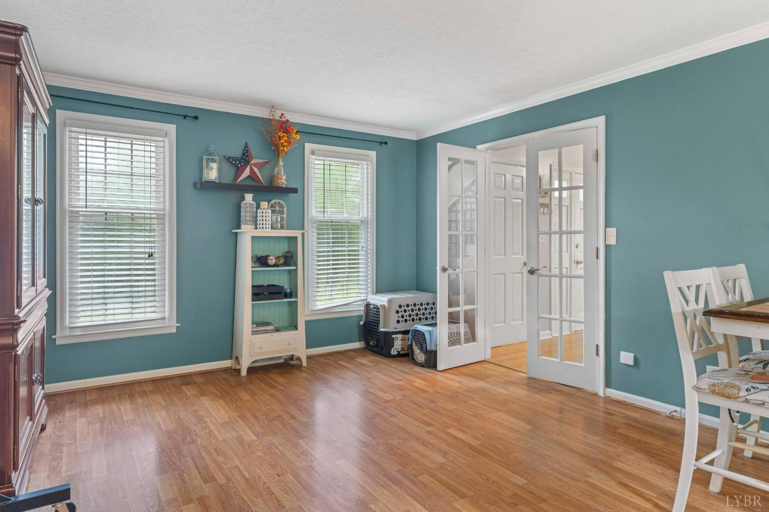 858 Farfields Drive Lynchburg, VA 24502 - Photo 27 of 61 a view of empty room with a window and wooden floor