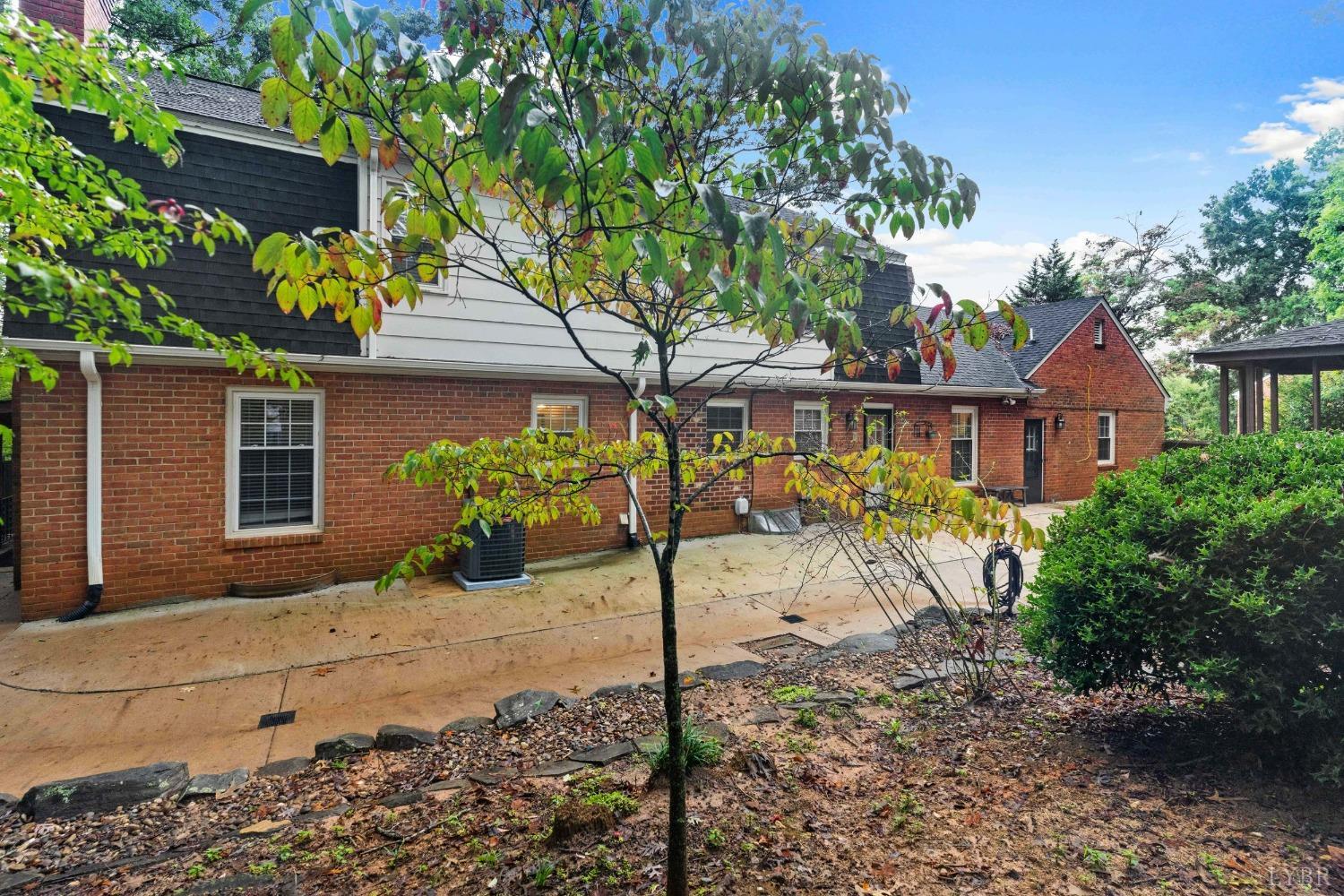858 Farfields Drive Lynchburg, VA 24502 - Photo 52 of 61 a front view of a house with garden