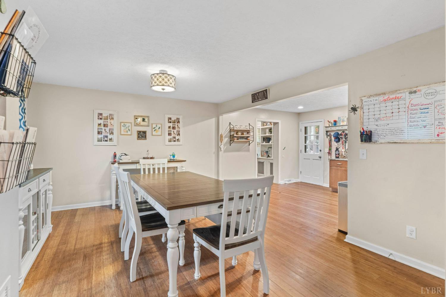 858 Farfields Drive Lynchburg, VA 24502 - Photo 7 of 61 a view of a dining room with furniture and wooden floor