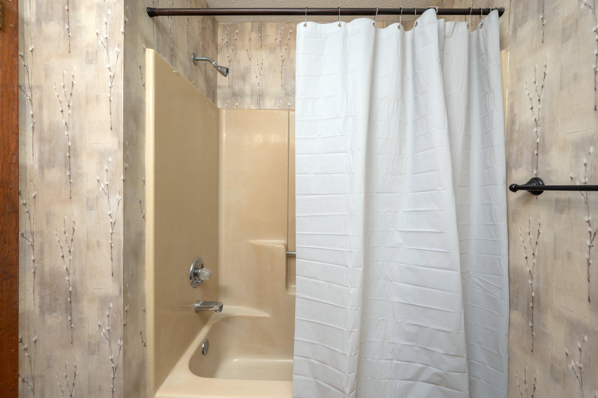 6141 Bud Moulton Road Crestview, FL 32536 - Photo 19 of 34 a bathroom with a shower and a sink