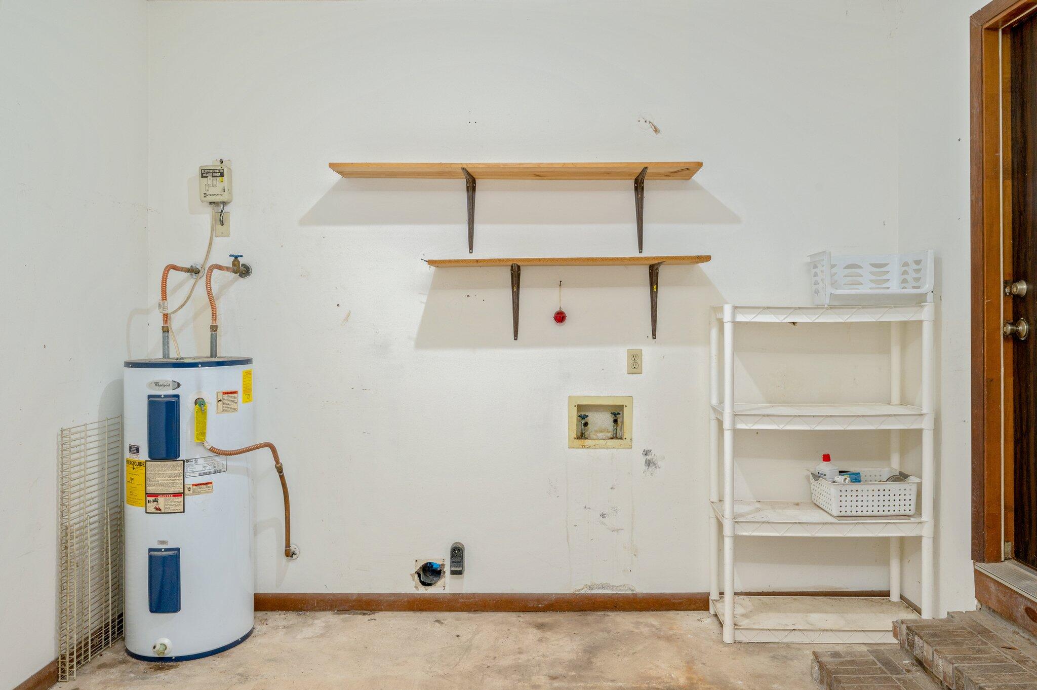 6141 Bud Moulton Road Crestview, FL 32536 - Photo 27 of 34 a view of storage and utility room
