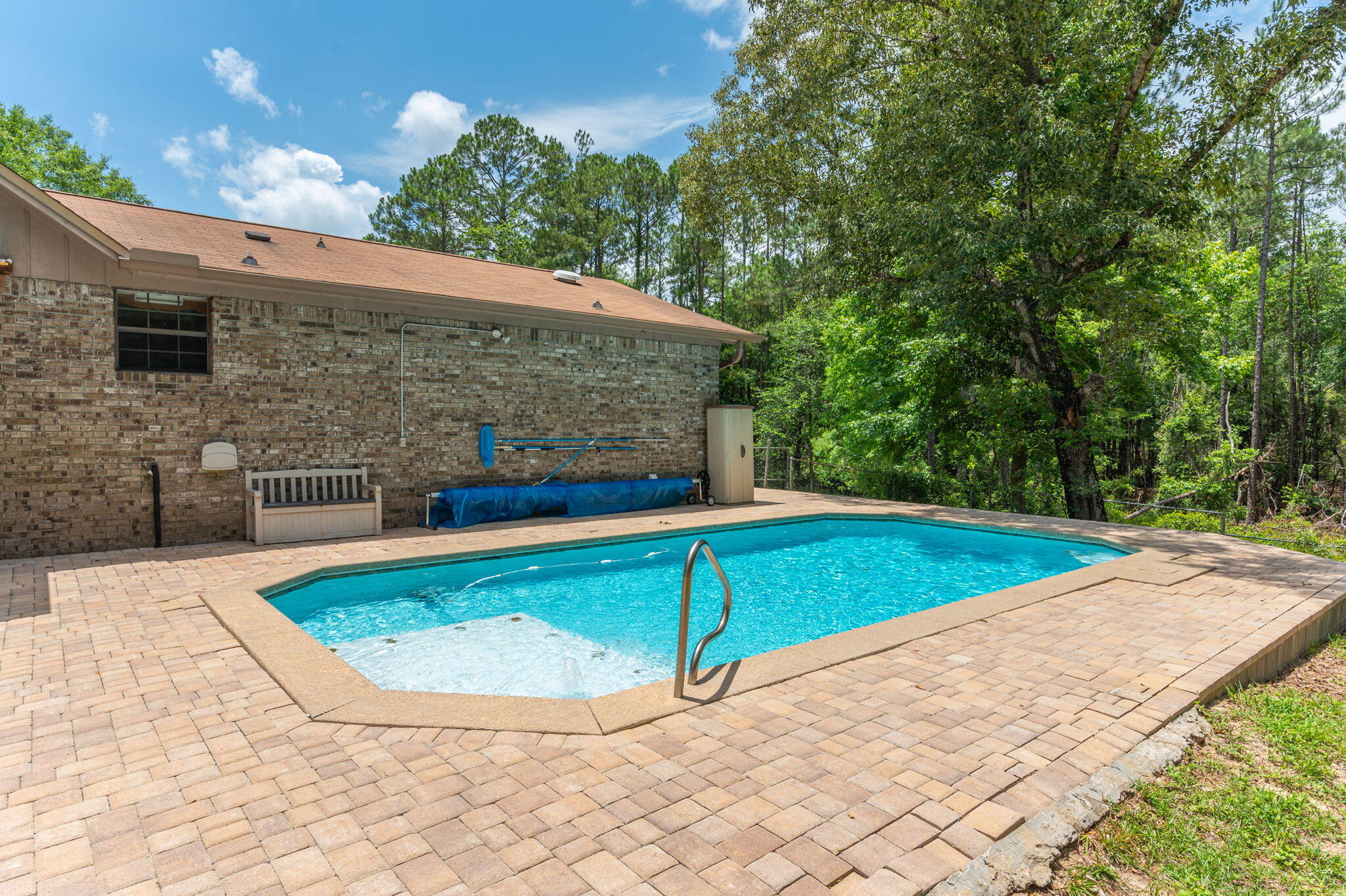 6141 Bud Moulton Road Crestview, FL 32536 - Photo 29 of 34 a view of a mini pool with an outdoor seating