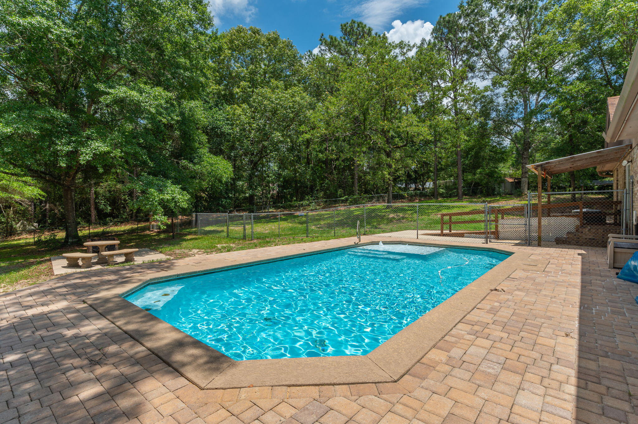 6141 Bud Moulton Road Crestview, FL 32536 - Photo 30 of 34 a view of a swimming pool and a yard
