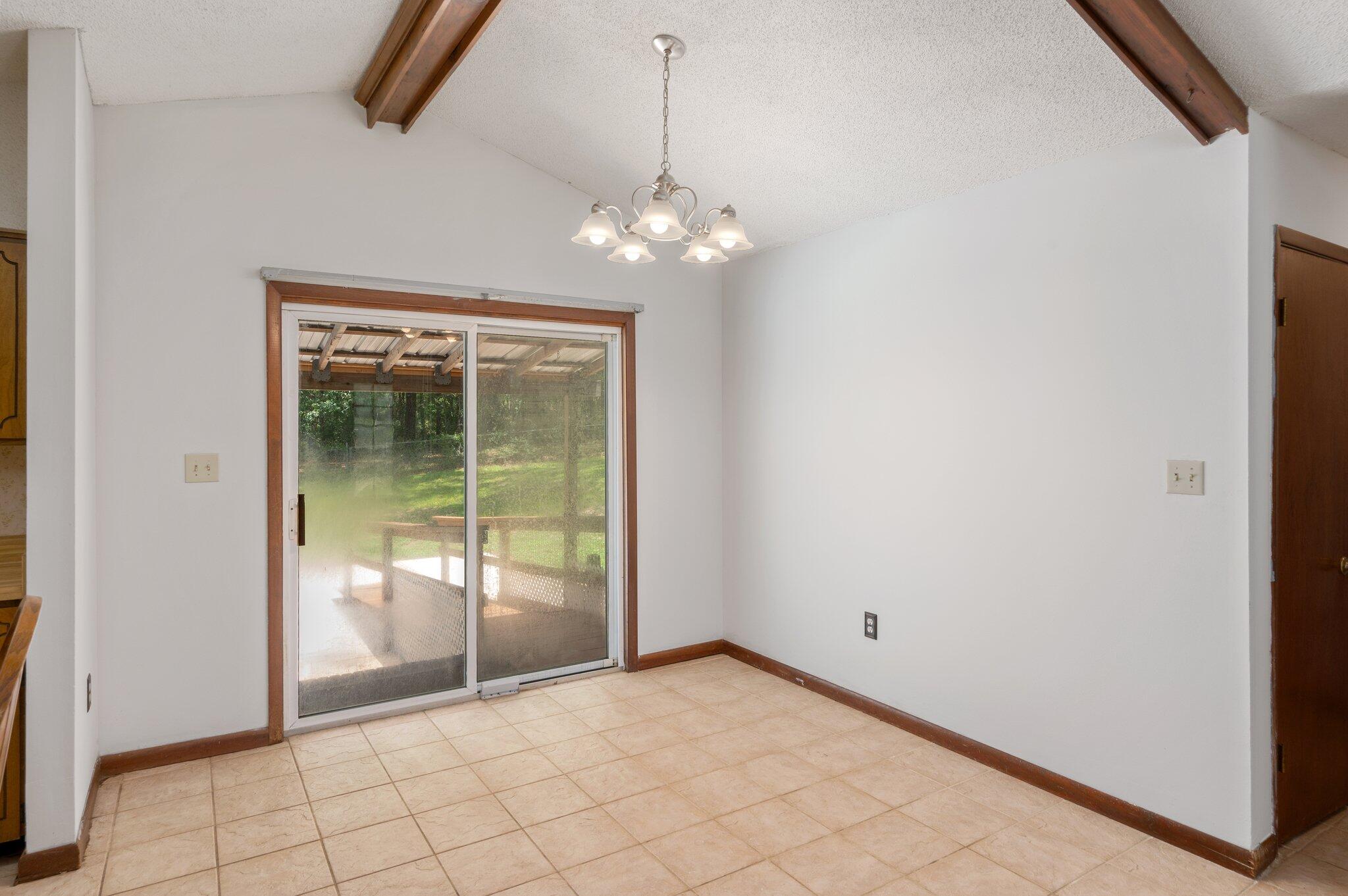 6141 Bud Moulton Road Crestview, FL 32536 - Photo 9 of 34 a view of an empty room with window
