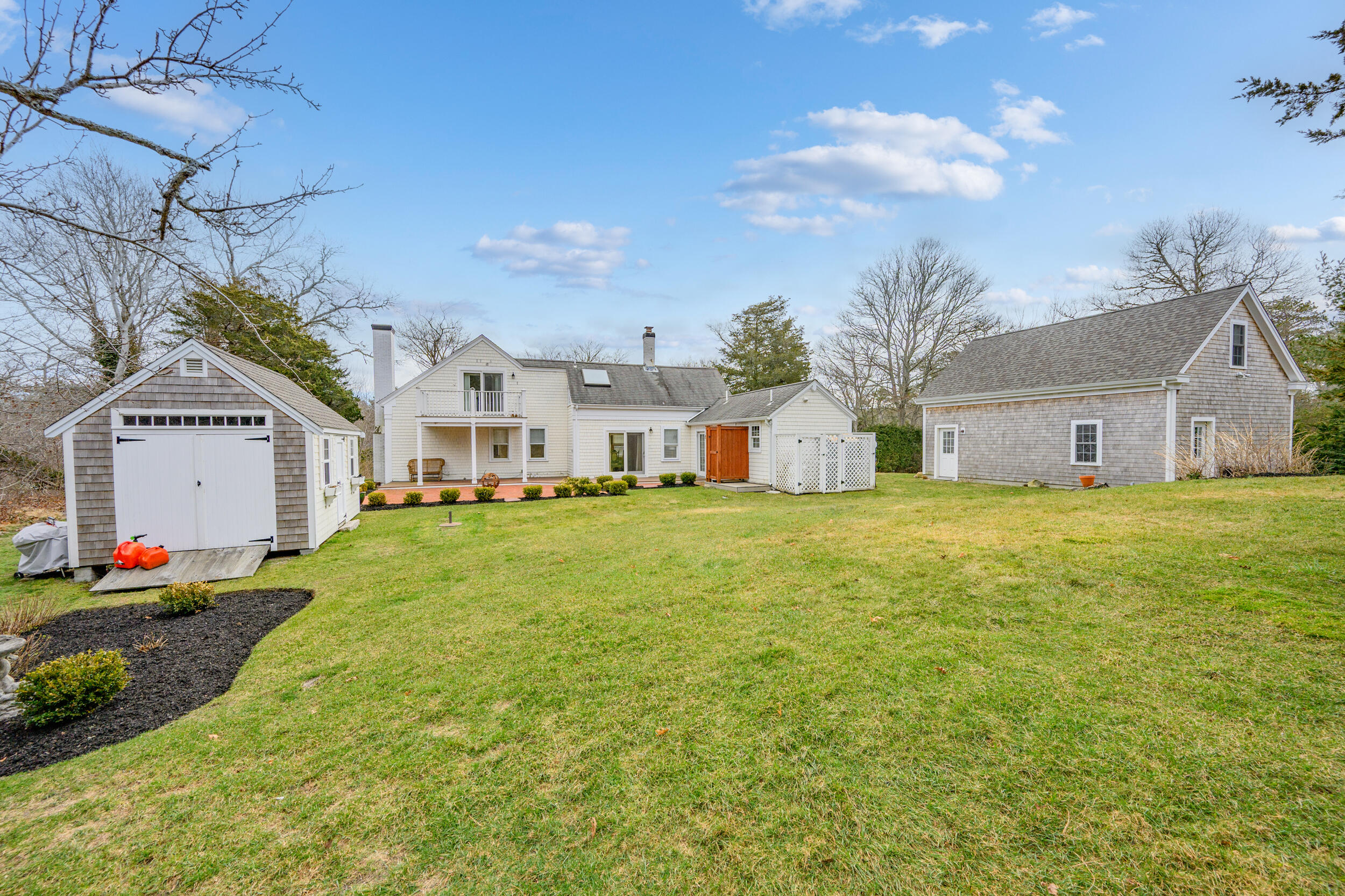 332 South Orleans Road Orleans, MA 02653 - Photo 36 of 42 a house view with a garden space