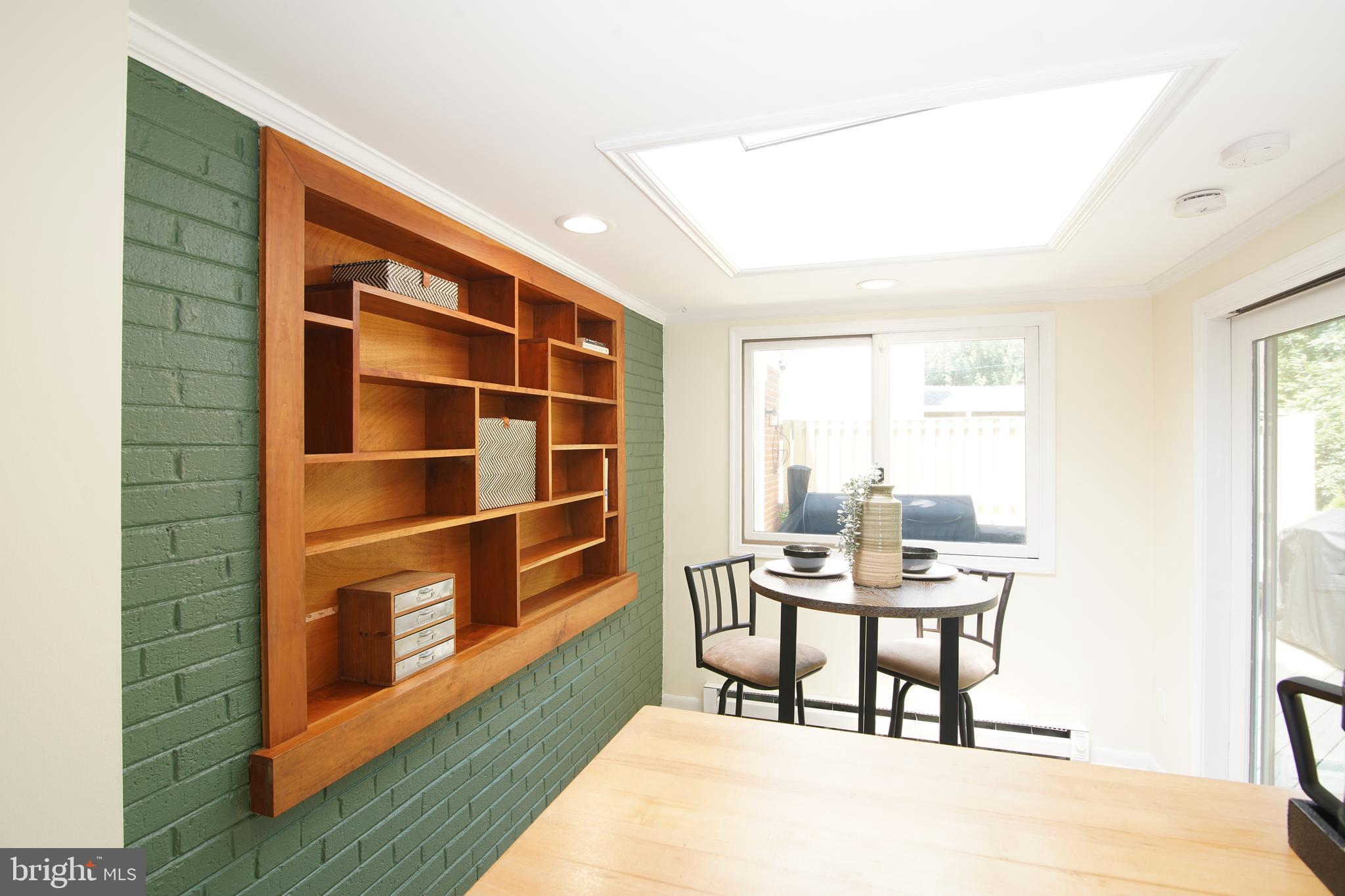 5602 Hawthorne Street Capitol Heights, MD 20743 - Photo 15 of 68 a workspace with furniture and window