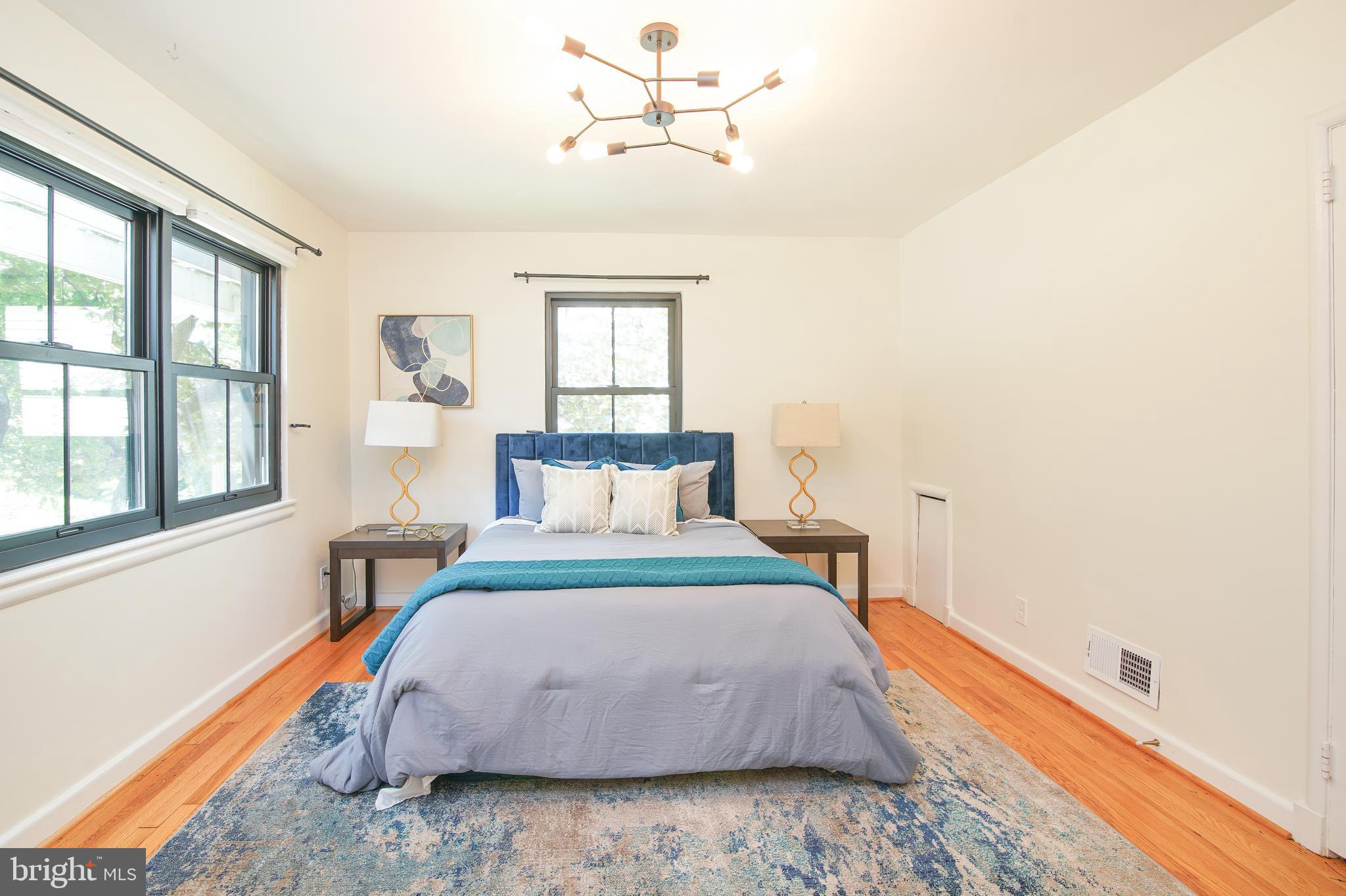 5602 Hawthorne Street Capitol Heights, MD 20743 - Photo 19 of 68 a bedroom with a bed and window