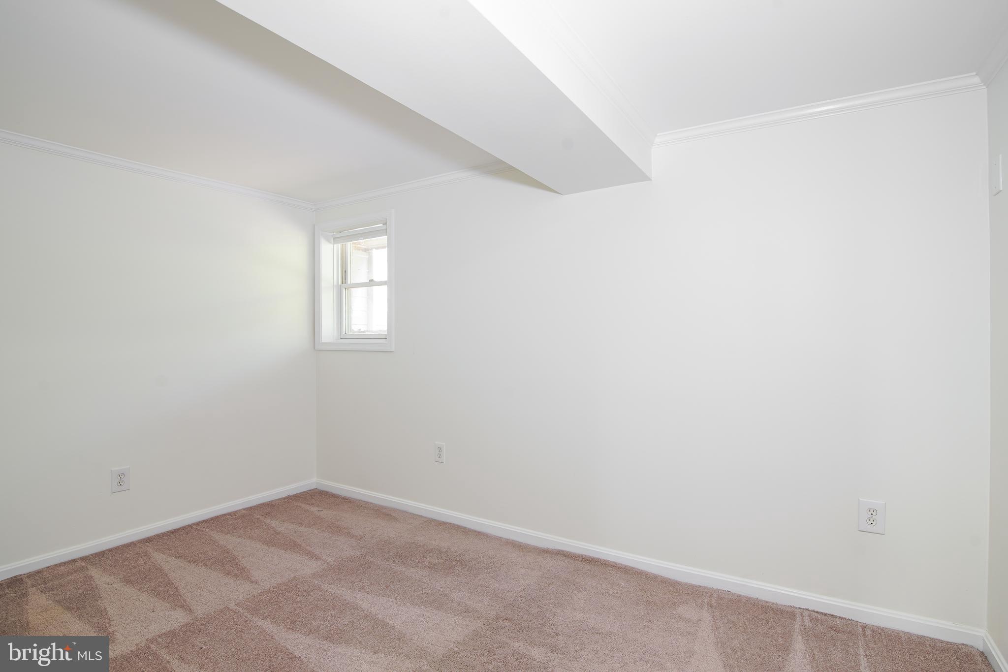 5602 Hawthorne Street Capitol Heights, MD 20743 - Photo 35 of 68 an empty room with a window