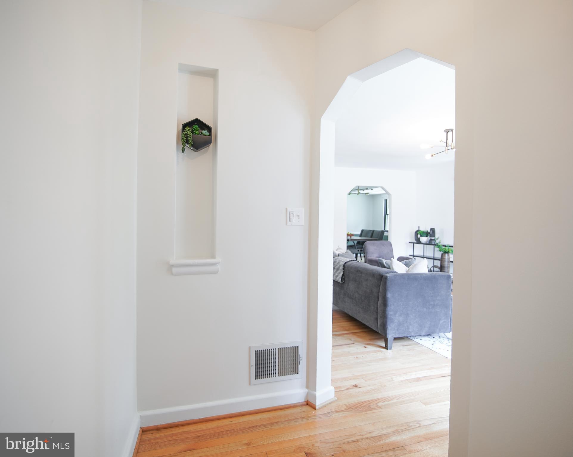 5602 Hawthorne Street Capitol Heights, MD 20743 - Photo 4 of 68 a view of a bedroom from a hallway