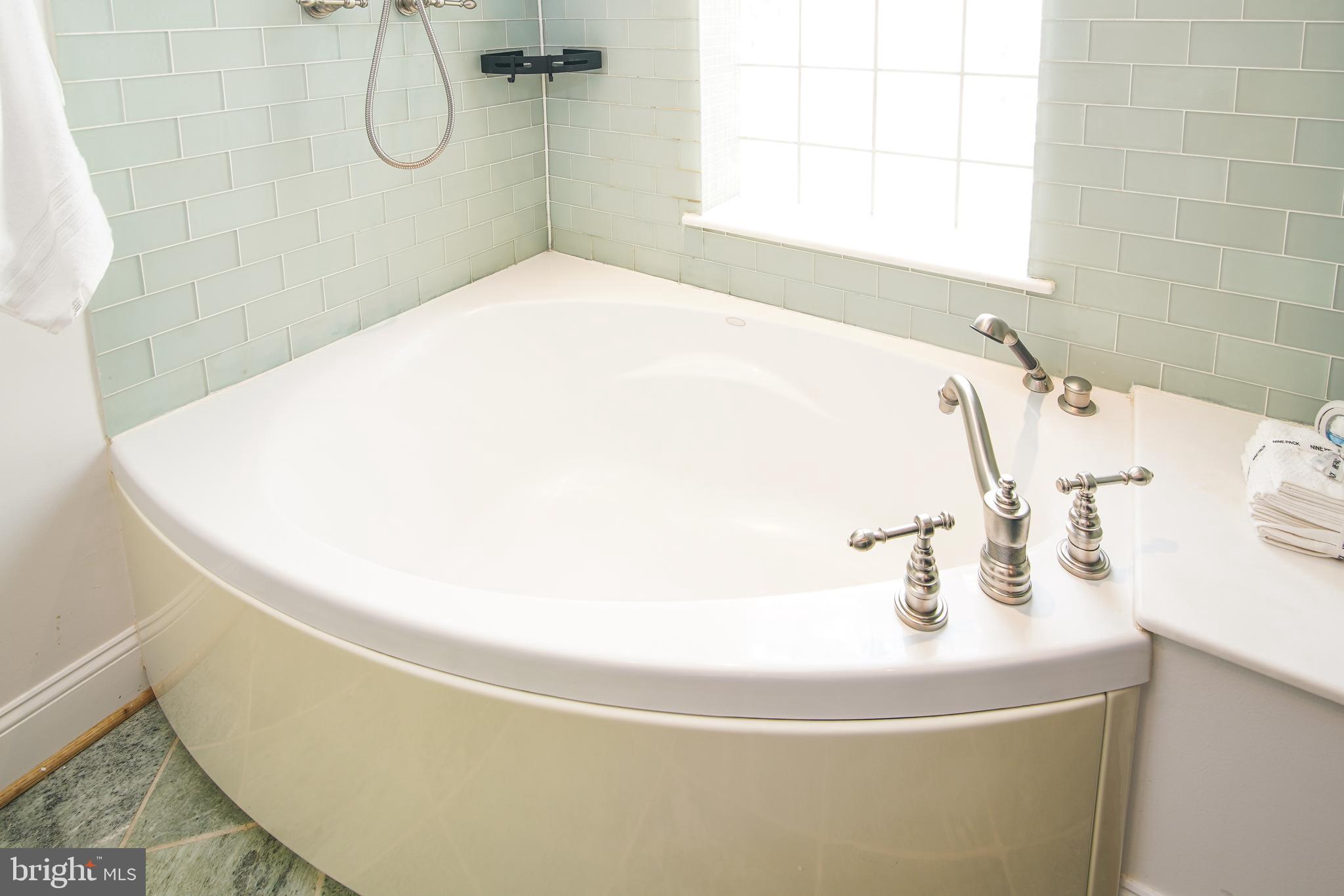 5602 Hawthorne Street Capitol Heights, MD 20743 - Photo 45 of 68 a bathroom with a sink and a window
