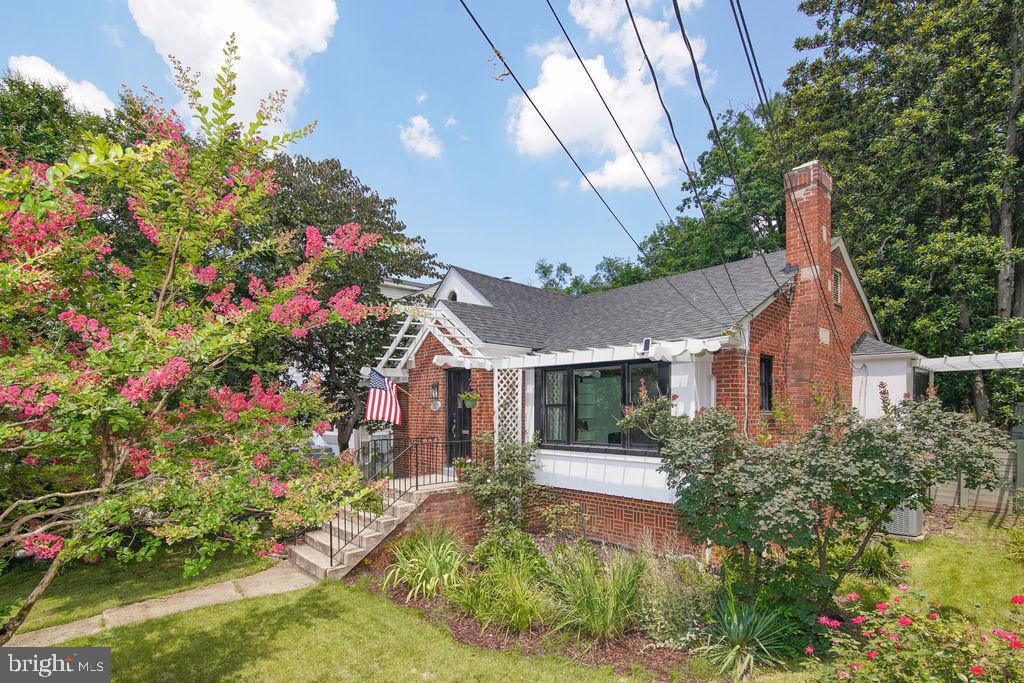 5602 Hawthorne Street Capitol Heights, MD 20743 - Photo 63 of 68 a front view of a house with a yard