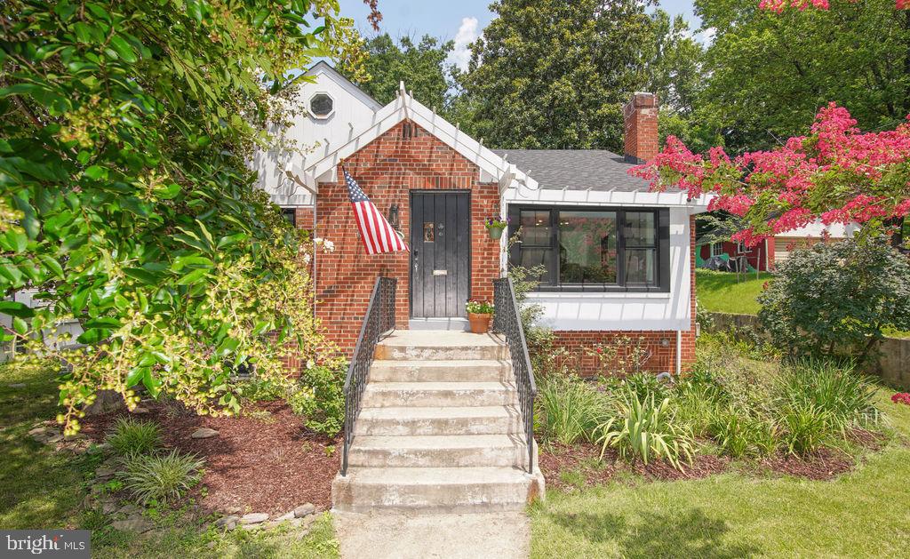 5602 Hawthorne Street Capitol Heights, MD 20743 - Photo 64 of 68 a front view of a house with a yard