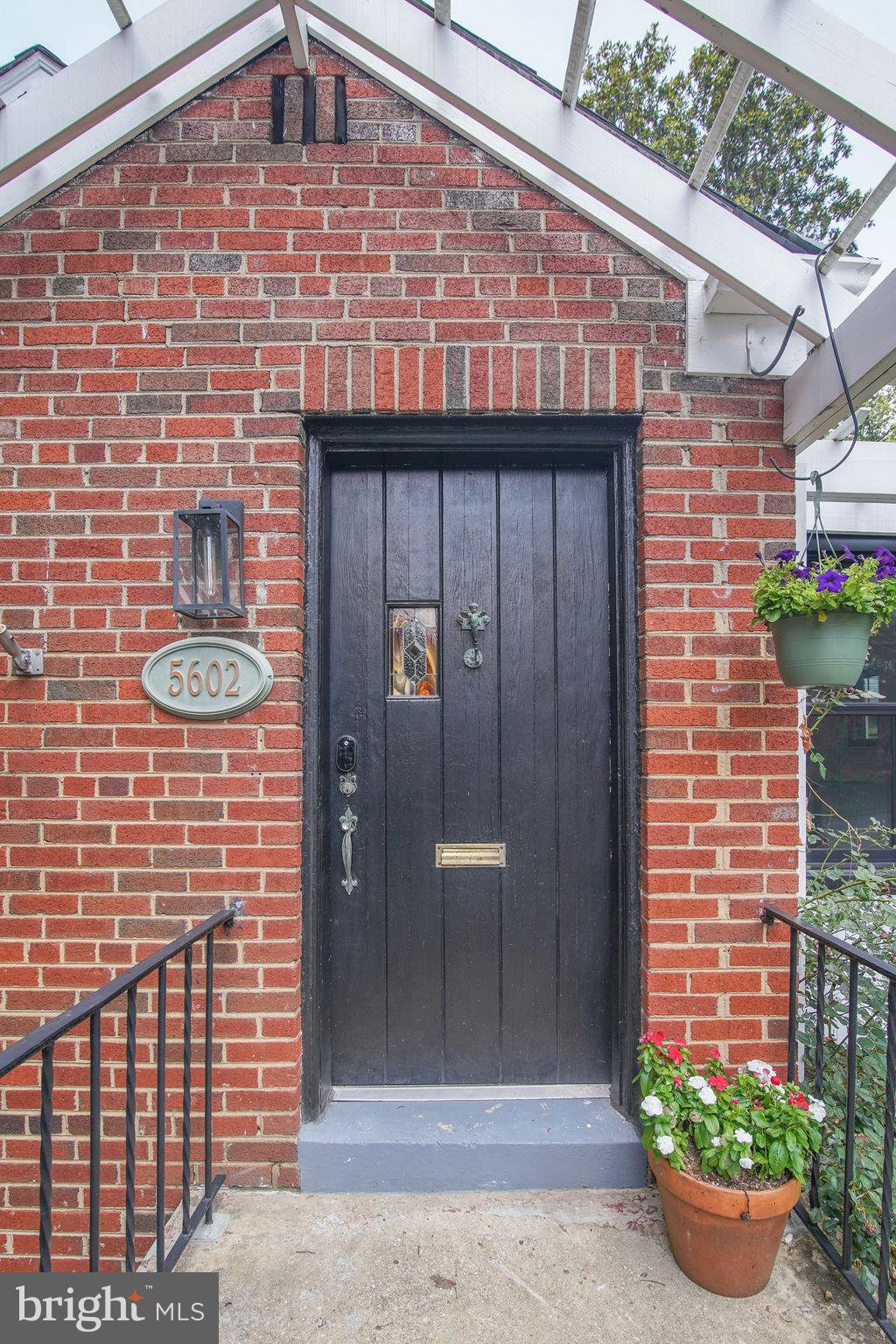 5602 Hawthorne Street Capitol Heights, MD 20743 - Photo 68 of 68 a view of a brick house with potted plants