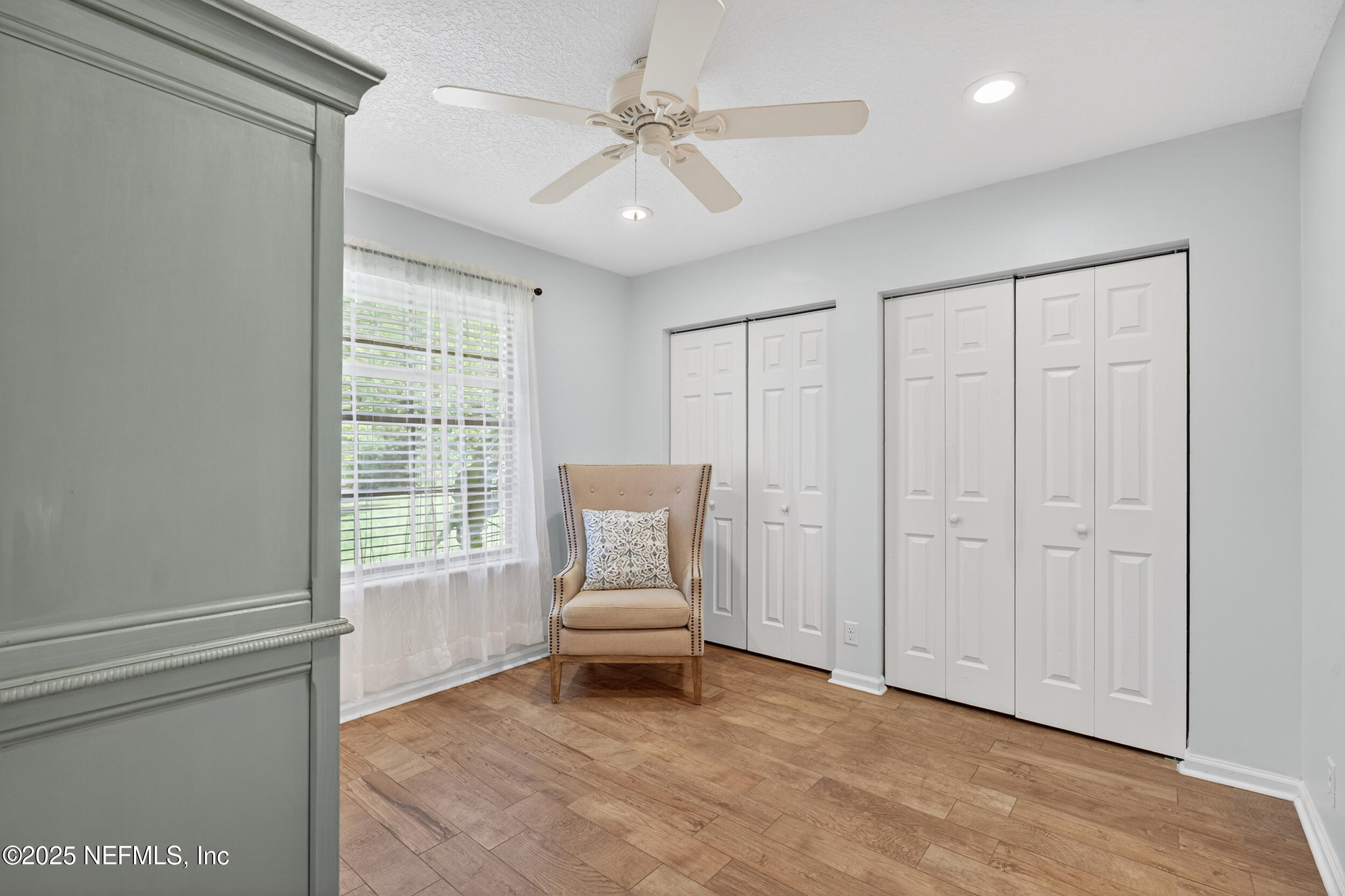 2836 Eagle Point Road Middleburg, FL 32068 - Photo 15 of 44 a living room with furniture and a window