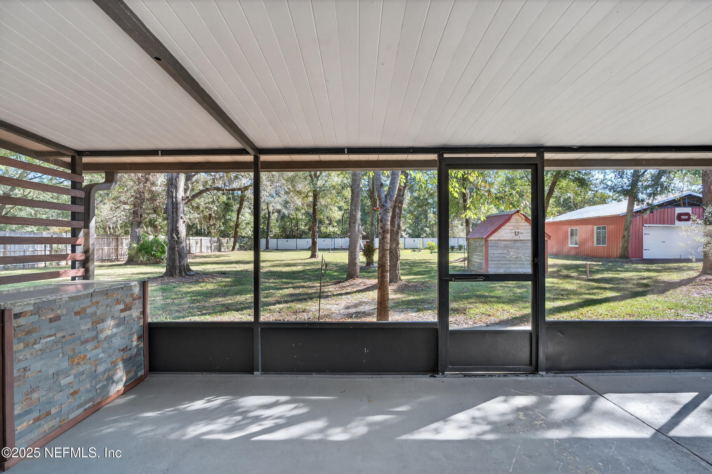 2836 Eagle Point Road Middleburg, FL 32068 - Photo 29 of 44 a view of a back yard from a balcony