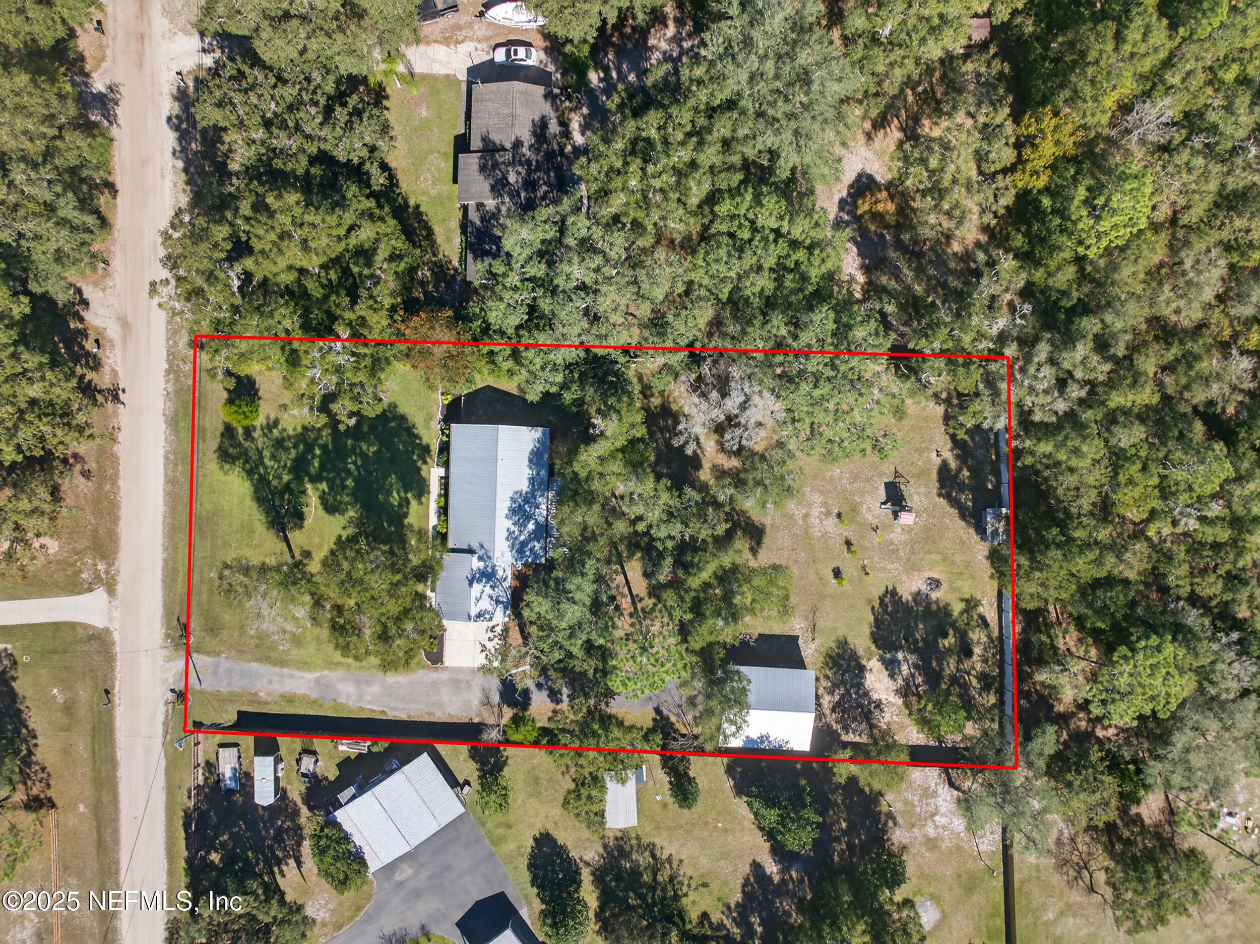 2836 Eagle Point Road Middleburg, FL 32068 - Photo 43 of 44 an aerial view of a residential houses with yard