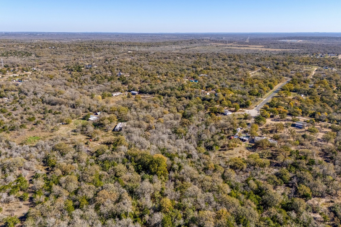 21400 Webberwood Ridge Drive Elgin, TX 78621 - Photo 2 of 22 an aerial view of residential houses with outdoor space