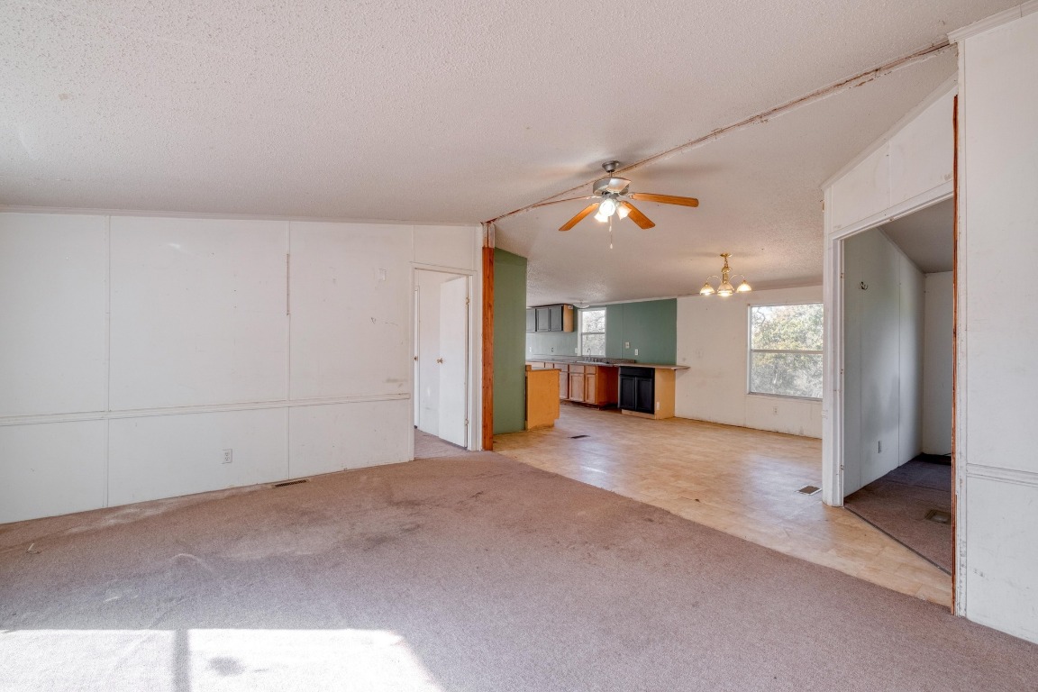 21400 Webberwood Ridge Drive Elgin, TX 78621 - Photo 5 of 22 an empty room with entrance and windows
