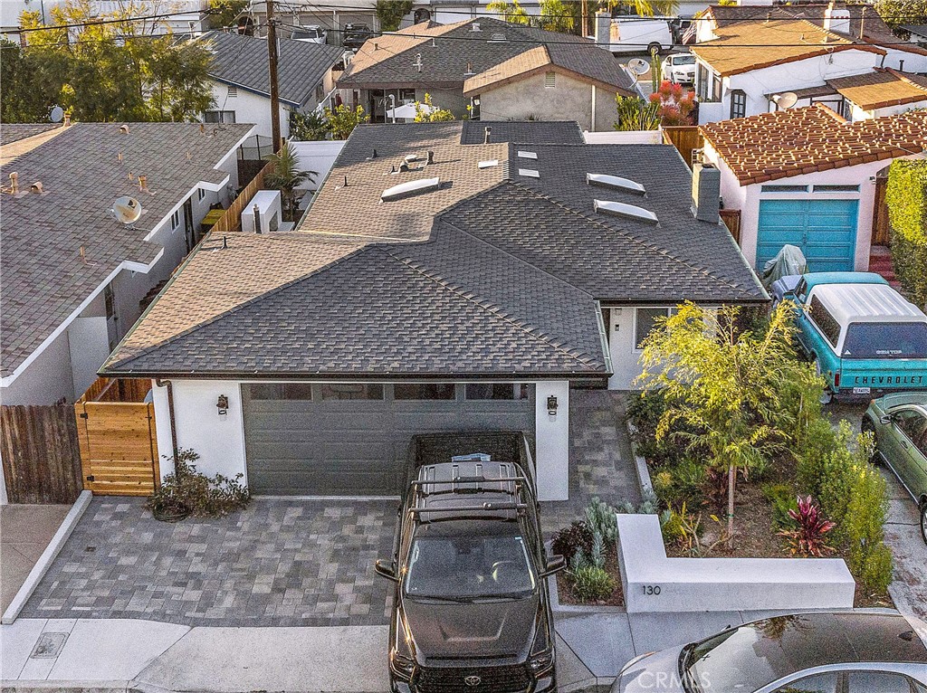 130 West Mariposa San Clemente, CA 92672 - Photo 38 of 43 a front view of a house with a yard balcony