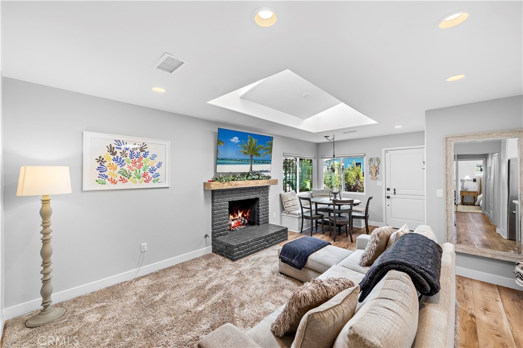 130 West Mariposa San Clemente, CA 92672 - Photo 8 of 43 a living room with furniture fireplace and window