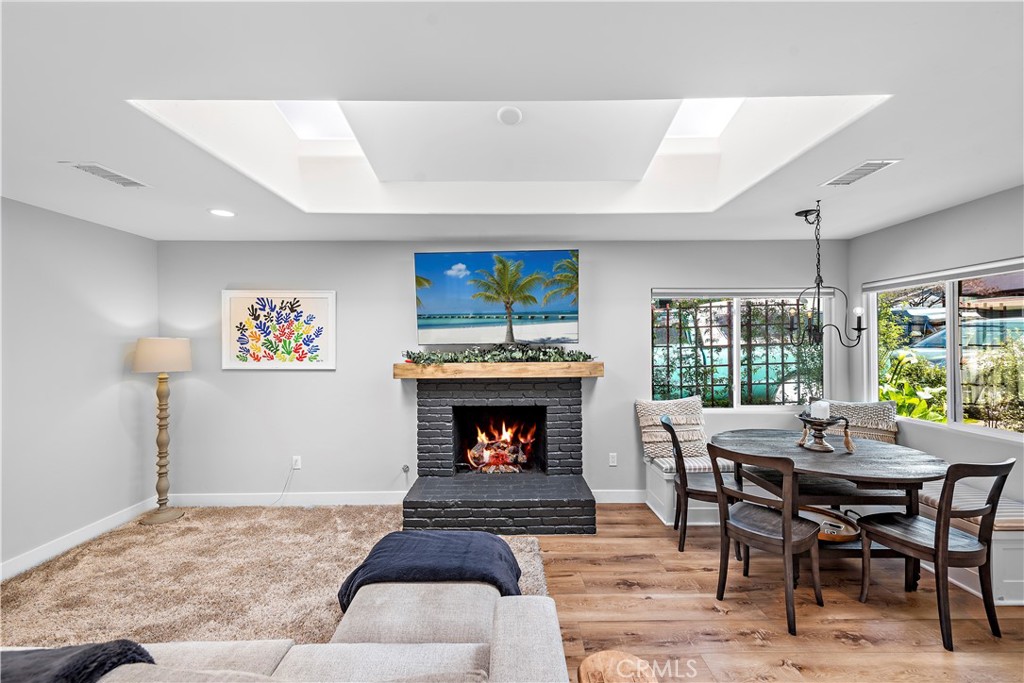 130 West Mariposa San Clemente, CA 92672 - Photo 9 of 43 a living room with furniture and a fireplace