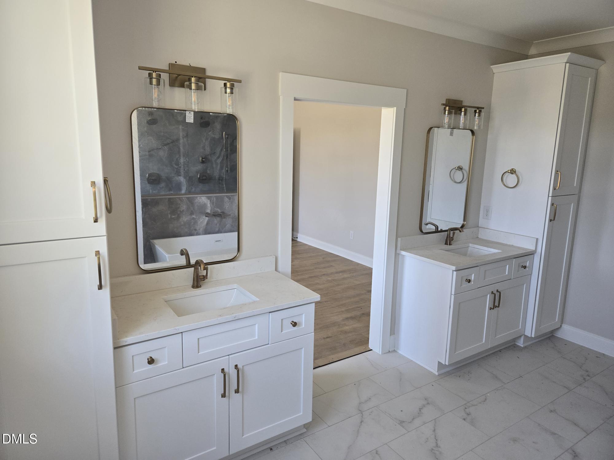 300 Avery Road Erwin, NC 28339 - Photo 29 of 38 a en suite bathroom with a granite countertop sink and a mirror