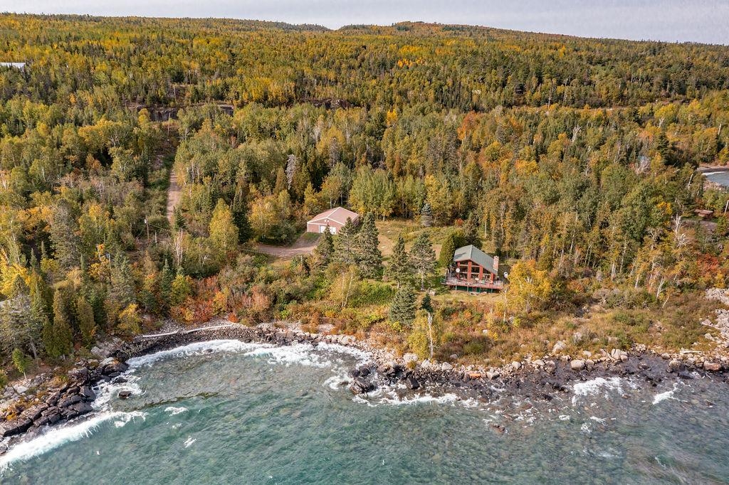 4346 Highway 61 Two Harbors, MN 55616 - Photo 24 of 65 Aerial overview of property's location with a forest and a nearby body of water