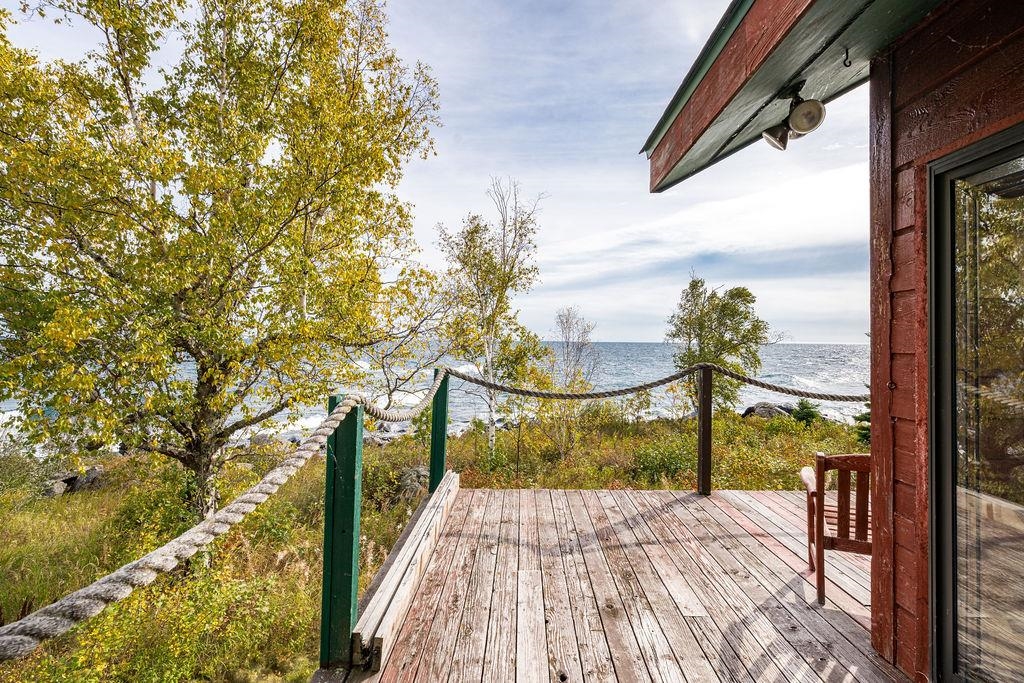 4346 Highway 61 Two Harbors, MN 55616 - Photo 7 of 65 Wooden deck featuring a water view