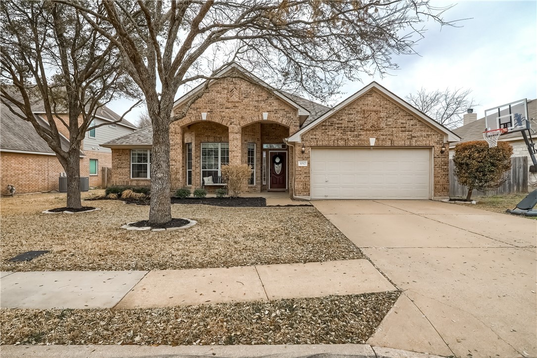 1012 Rutherford Drive Leander, TX 78641 - Photo 1 of 1 a front view of a house with garage