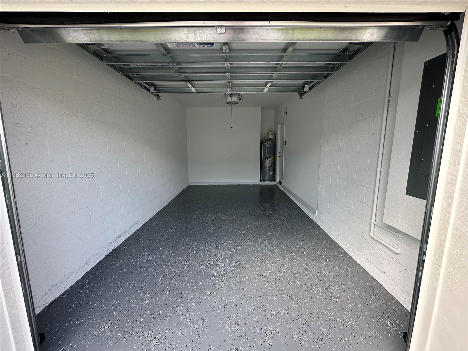 402 Southeast Crossoak Lane, Unit 402 Port St. Lucie, FL 34984 - Photo 1 of 87 a view of a room with racks