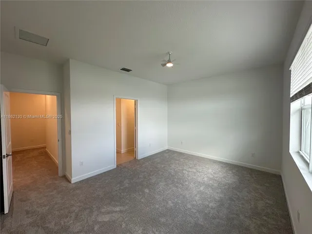 a view of a back yard of the house