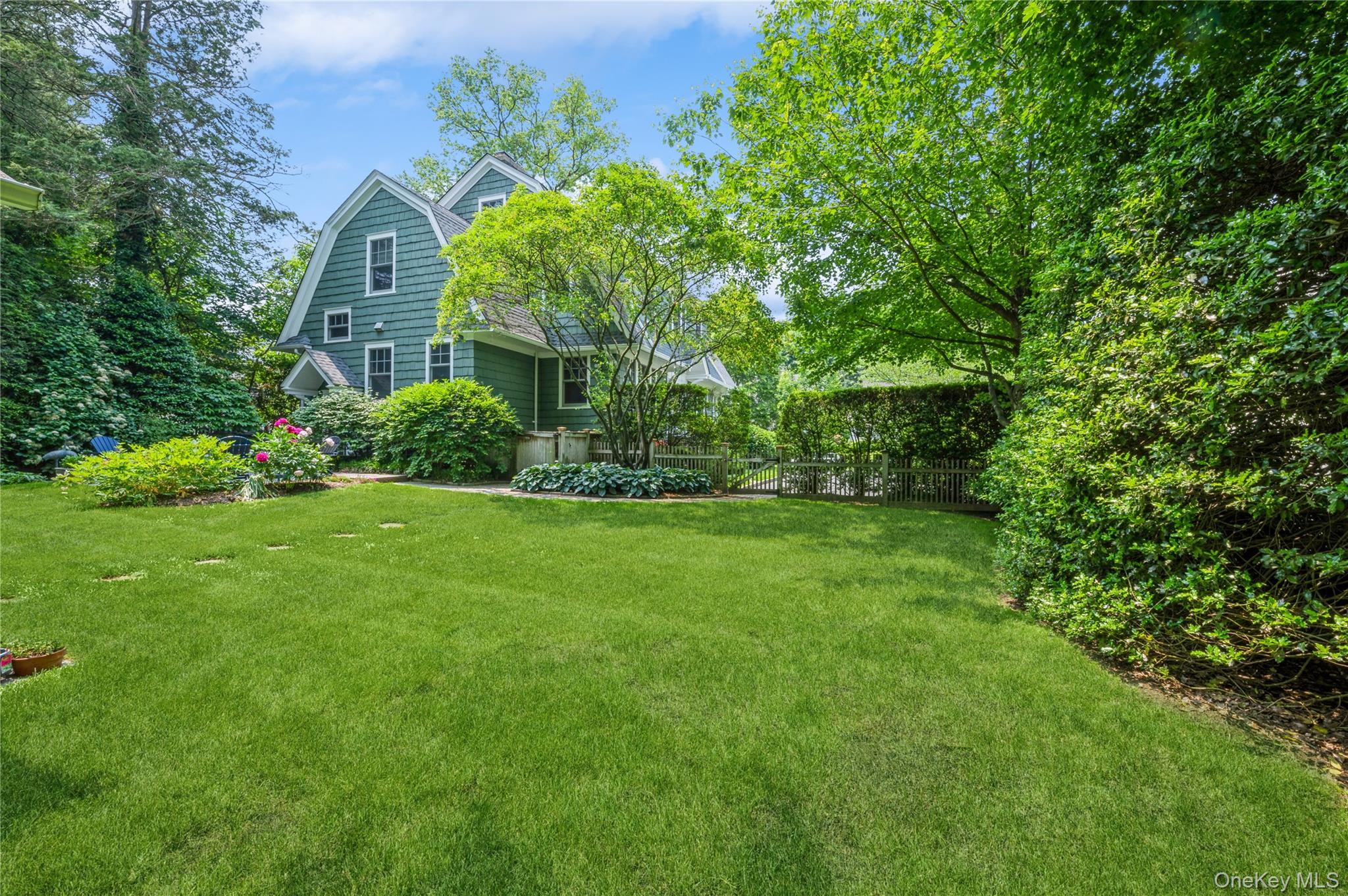 31 Emerson Road Larchmont, NY 10538 - Photo 34 of 43 The yard is flat, private and fenced. Mature plantings and plenty of sun for a garden.