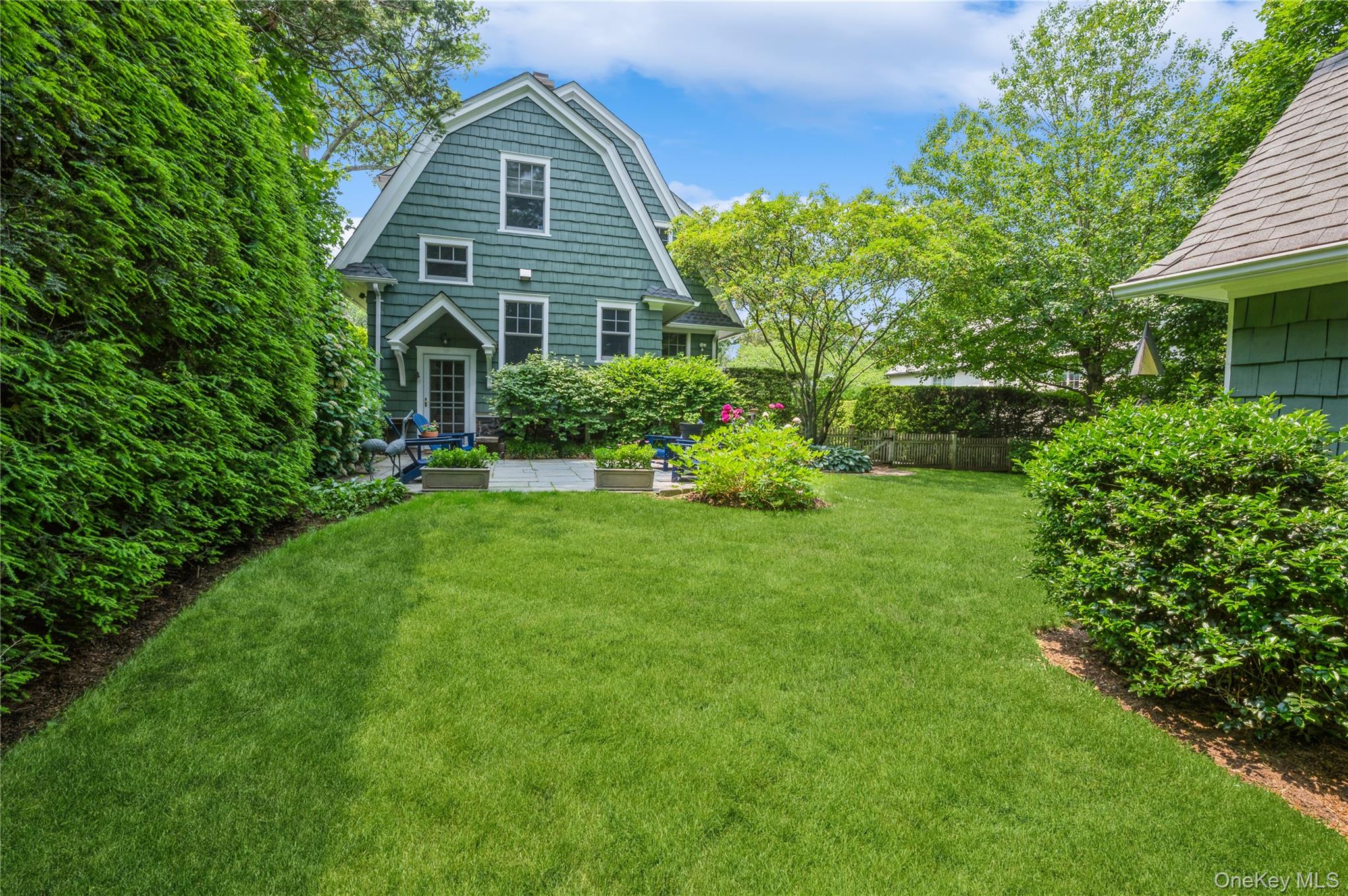 31 Emerson Road Larchmont, NY 10538 - Photo 36 of 43 The yard is flat and private. A freestanding garage makes a great ping pong or rainy day play space. Garage band anyone?