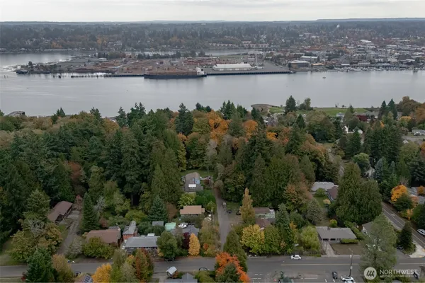 an aerial view of a city with lake view
