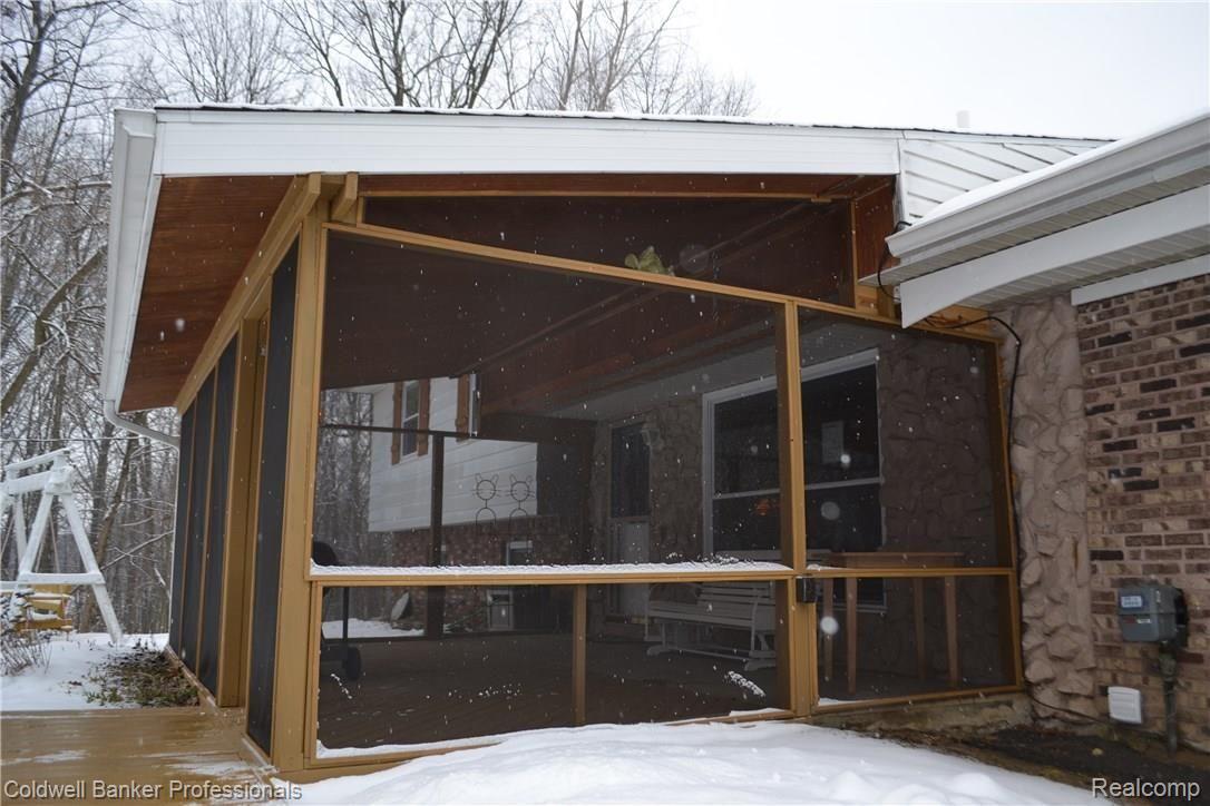 4530 Timber Lane Dryden, MI 48428 - Photo 6 of 36 Screen Porch to Front Door