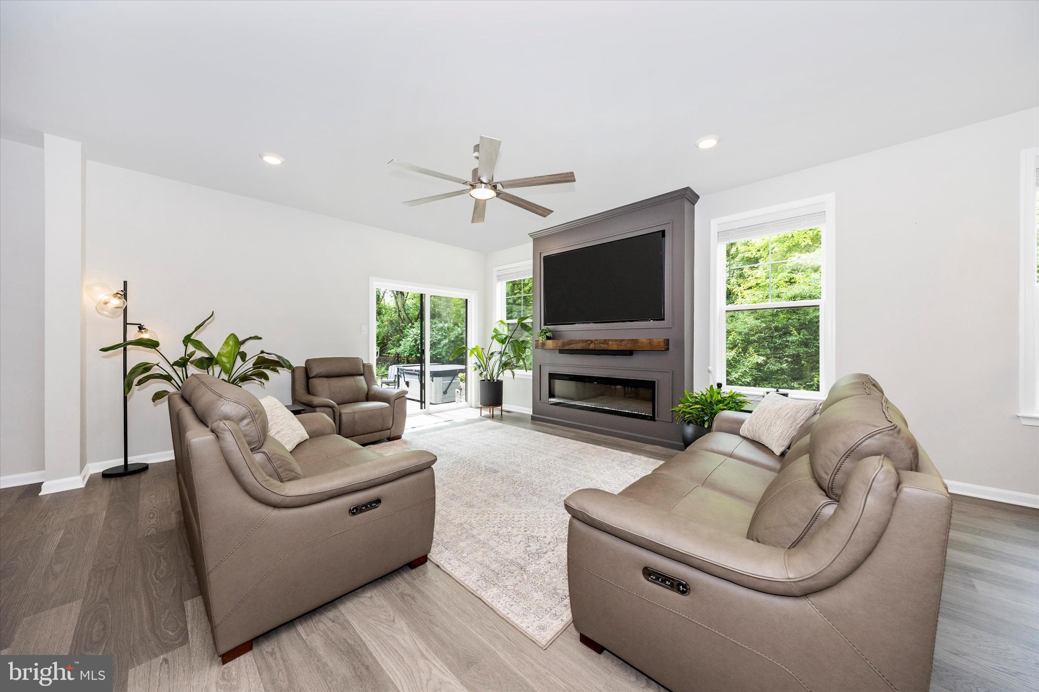 700 Bond Street Frederick, MD 21701 - Photo 8 of 49 a living room with furniture a window and a flat screen tv
