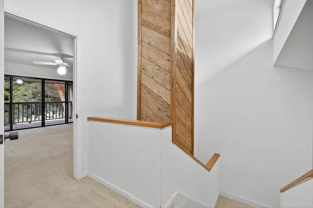 a view of balcony with wooden floor
