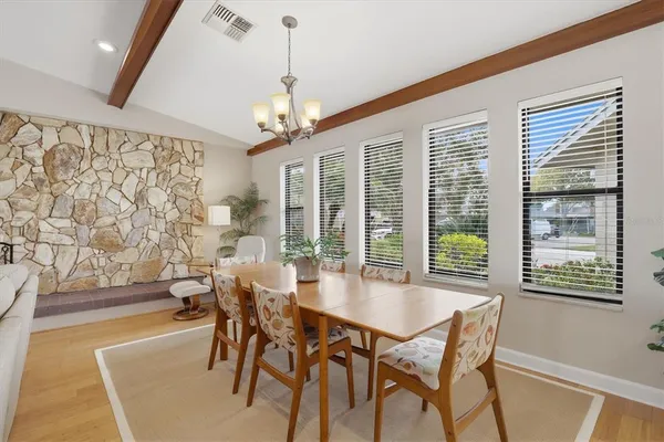 a bedroom with a bed and a night stand