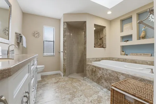 a bathroom with a sink and a shower