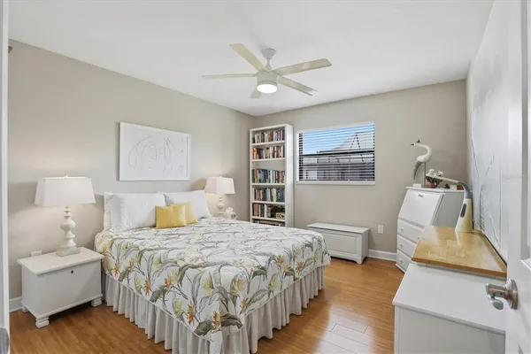 a view of a porch with furniture and a yard