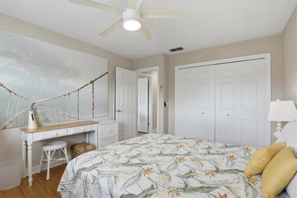 a view of a swimming pool and outdoor seating