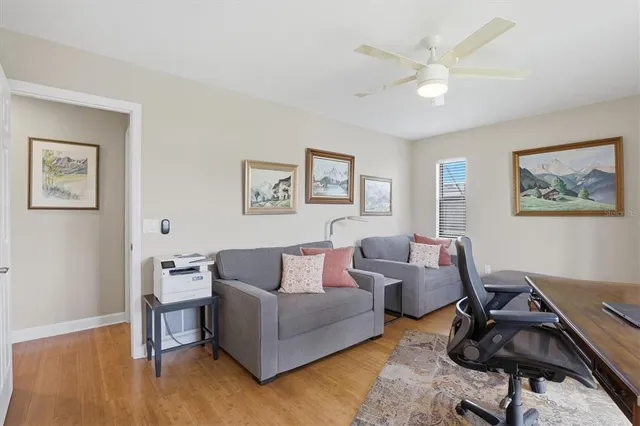 a view of a house with backyard patio and swimming pool