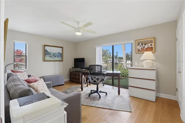 a view of a house with swimming pool and porch
