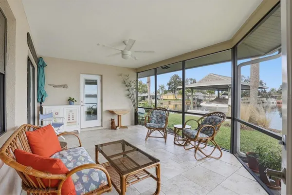 a view of a swimming pool with a patio