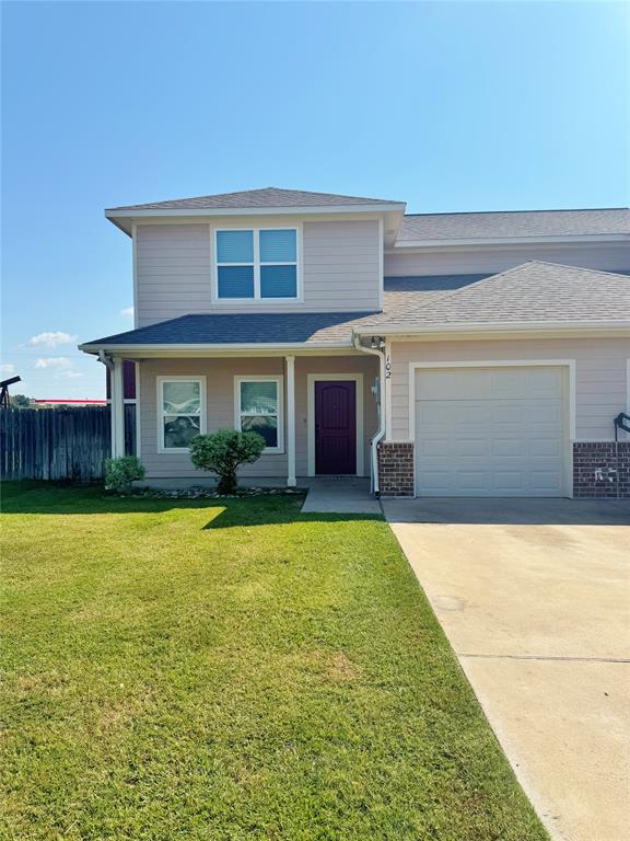 102 Bridle Court Mabank, TX 75143 - Photo 1 of 1 a front view of a house with a garden and yard